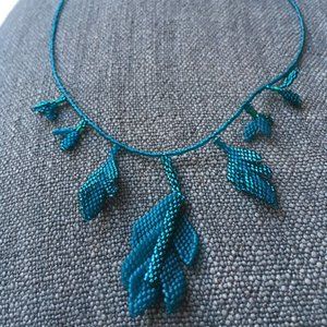 Artist created Delicato bead necklace.